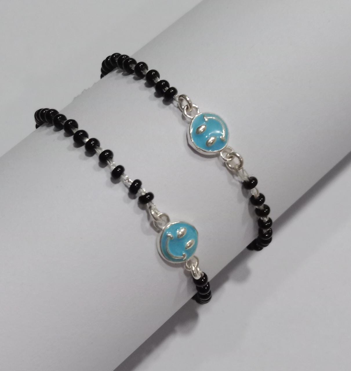 Pushker Badri Sarraf Blue Smilie Black Beads Bracelet - NZ-BSML